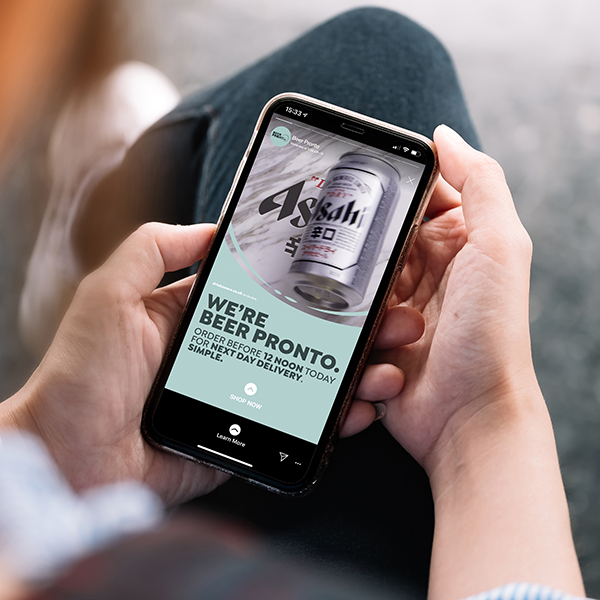 Asahi Super Dry on a phone